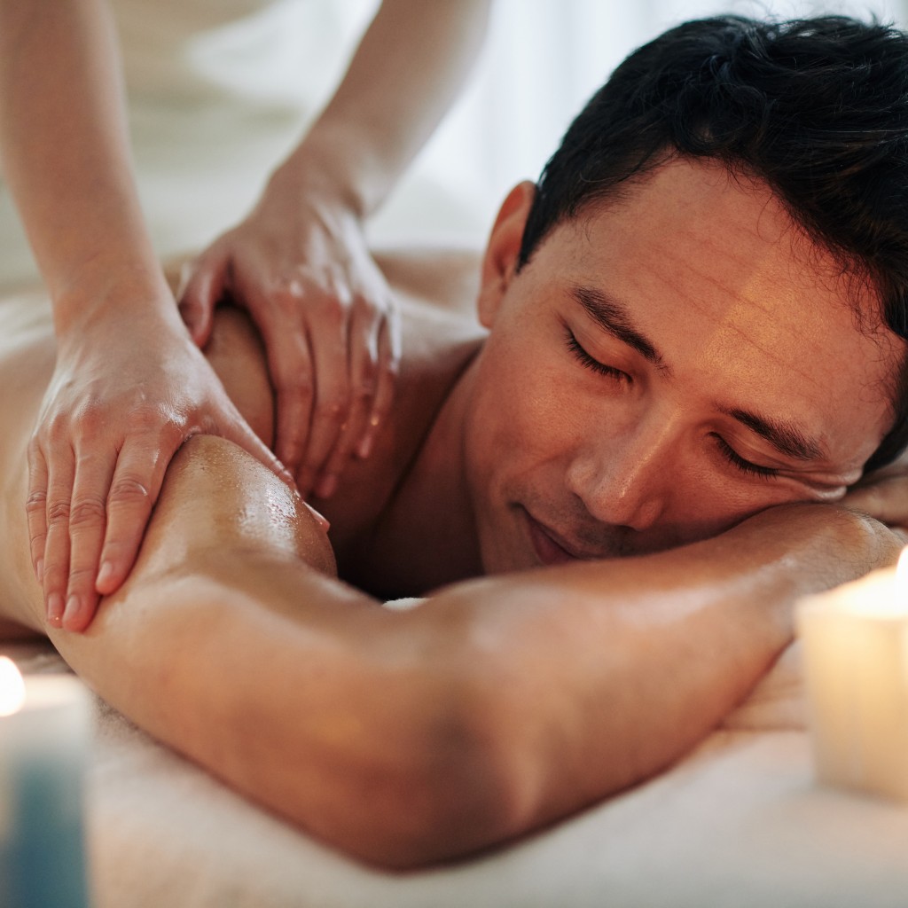 Female therapist performing a premium full body massage on a male client at a luxury spa in Sakinaka